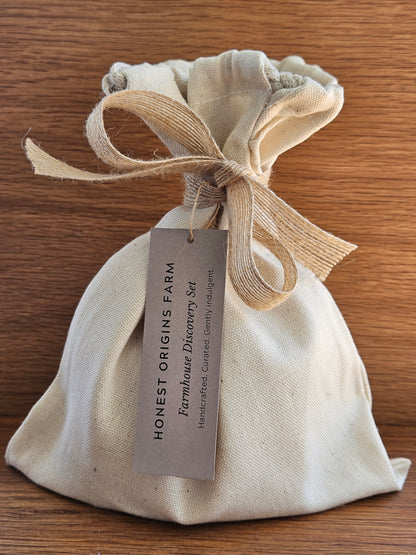 Fabric pouch with a bow and label on a wooden surface